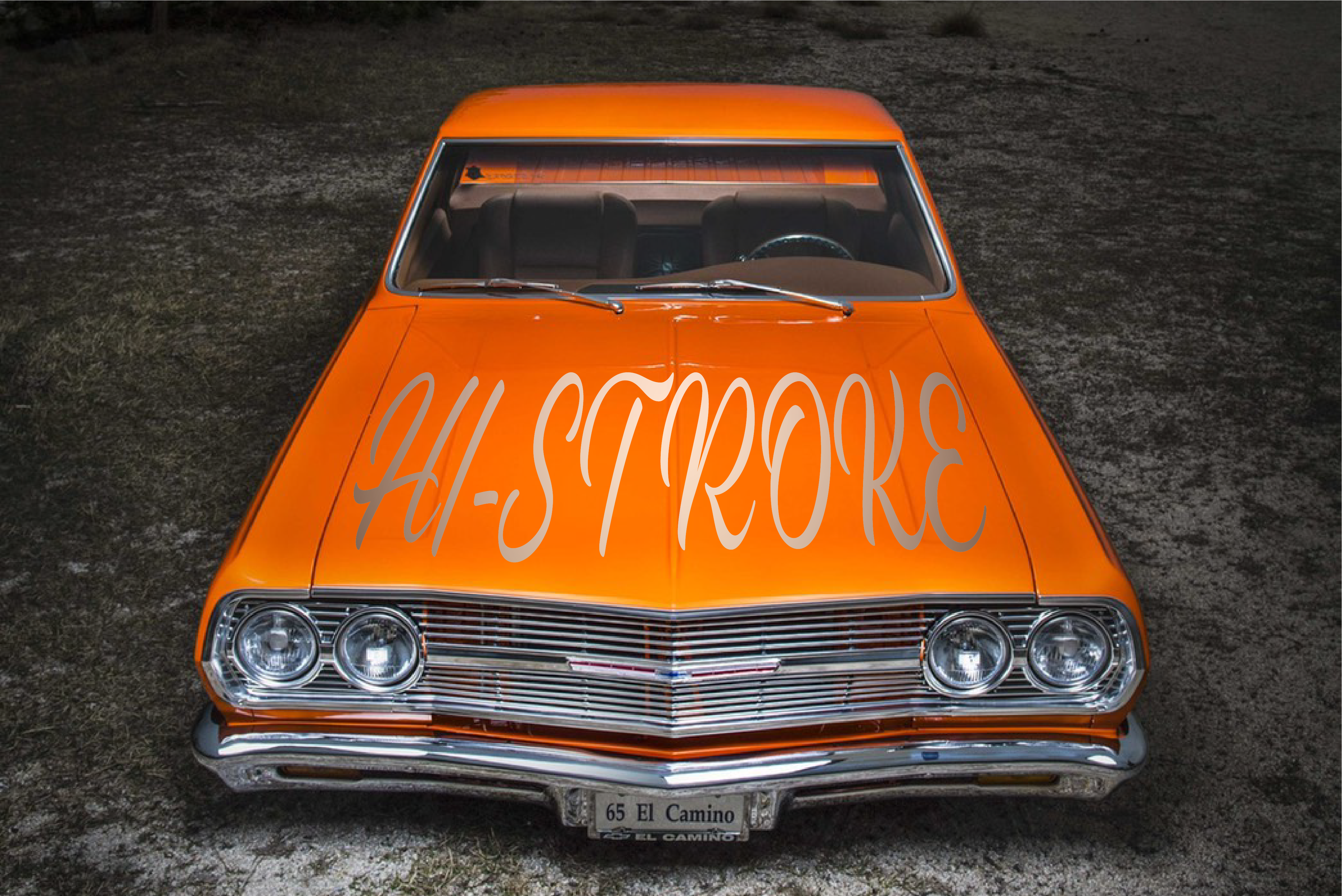 オレンジの車正面写真
